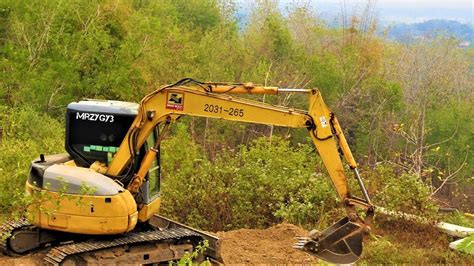 mini excavator clearing land youtube|brush rakes for mini excavators.